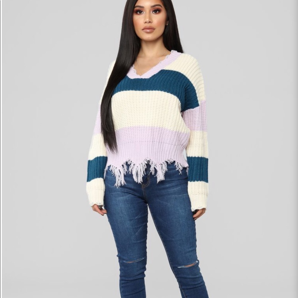 Cute distressed sweater